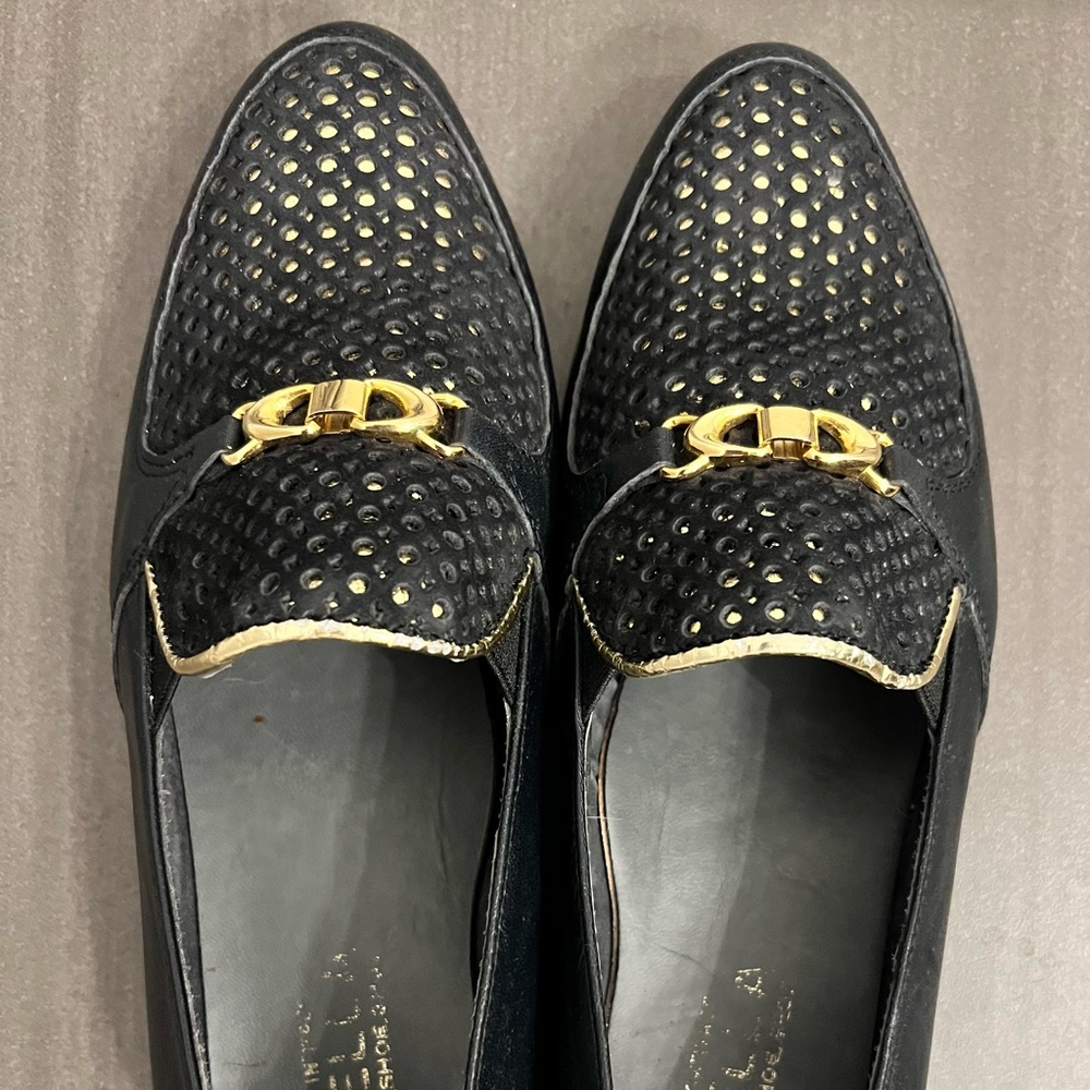 These shoes would fit a child or adult. Size 6.5